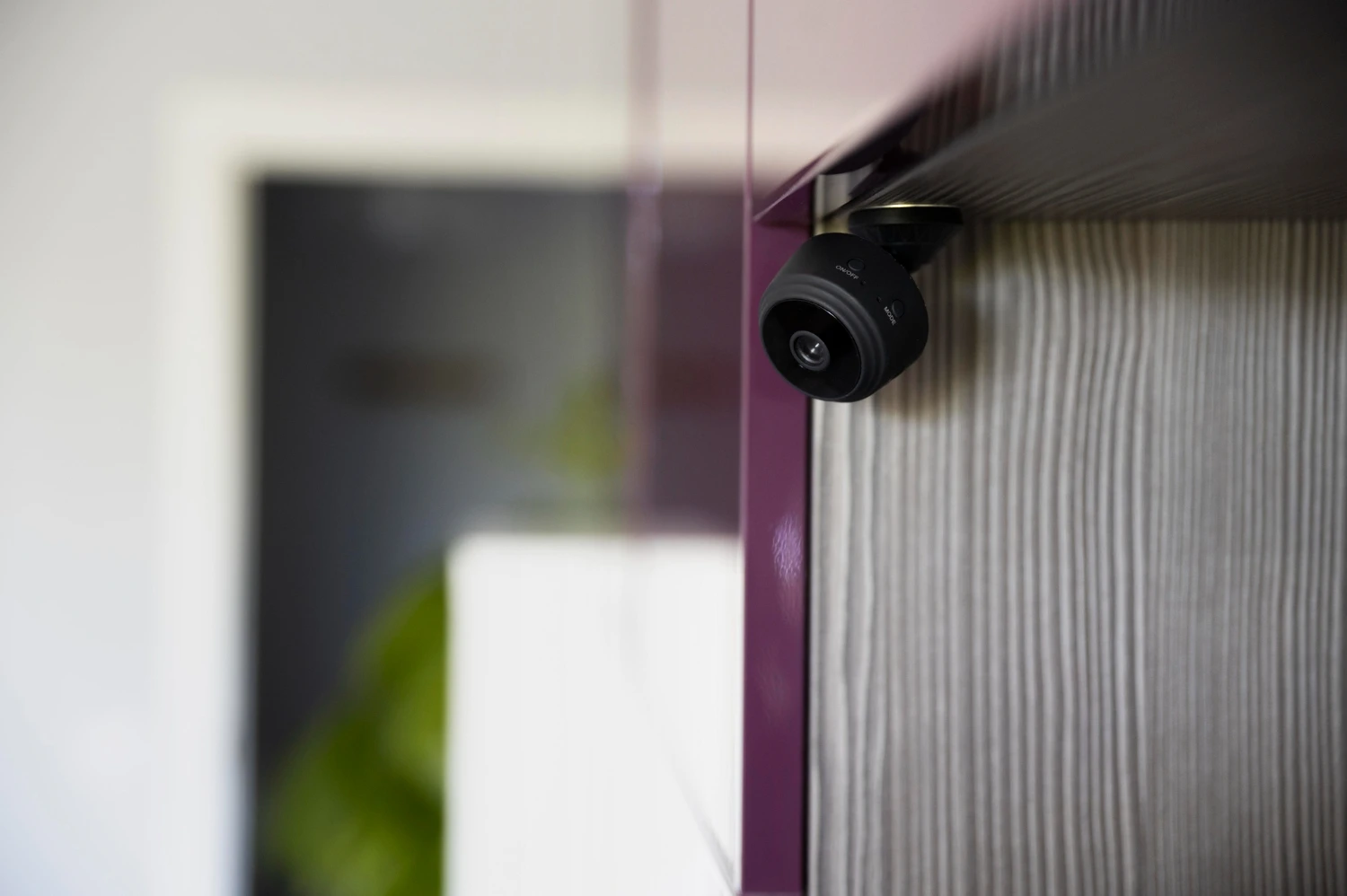 Close-up of a mounted camera on a surface.