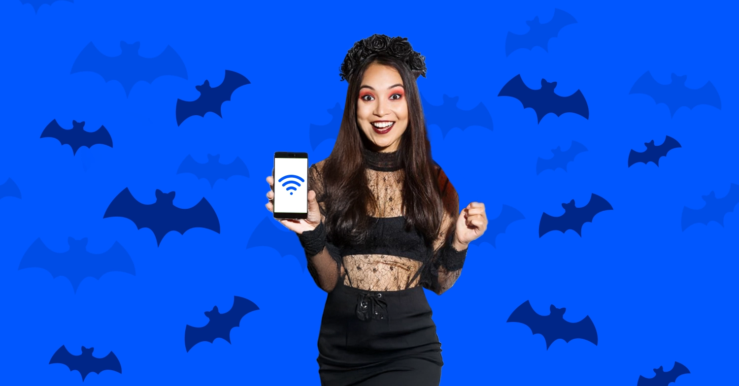 Cheerful woman holding WiFi-enabled smartphone